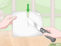 تست کردن چاقو با کاغذ